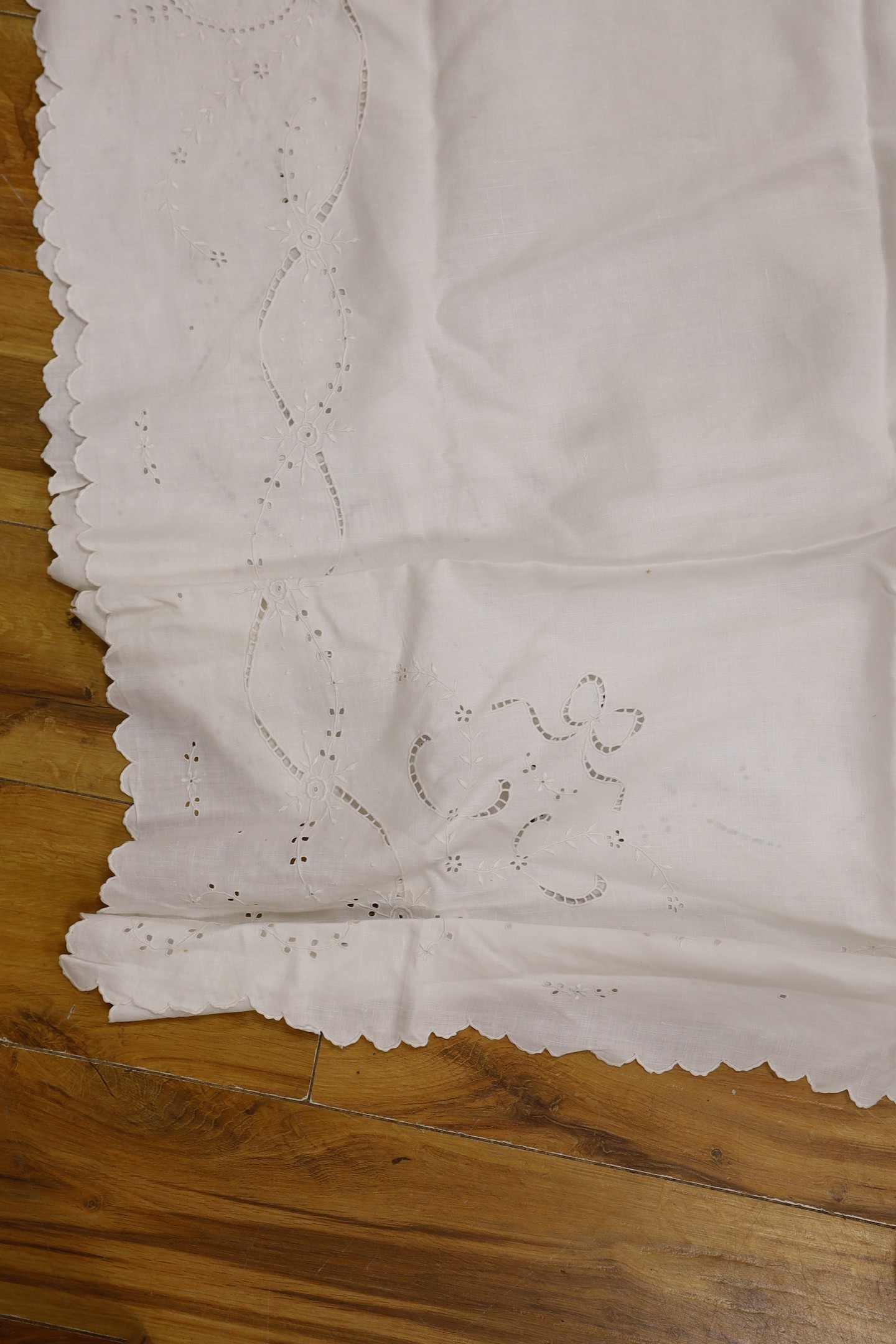 A collection of cut work and crochet edged table linens